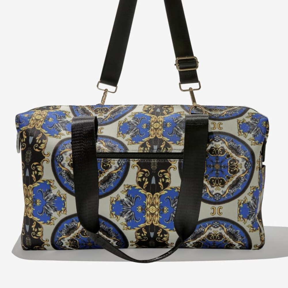 Alice + Olivia Duffle bag.  New in package